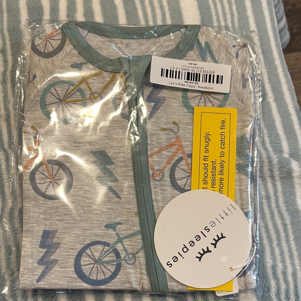 NIB Little Sleepies Let’s Ride Zippy size newborn